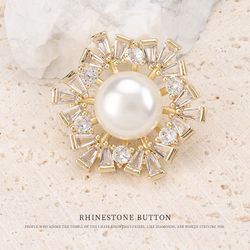 Gold coat button with round pearl center and clear rhinestones