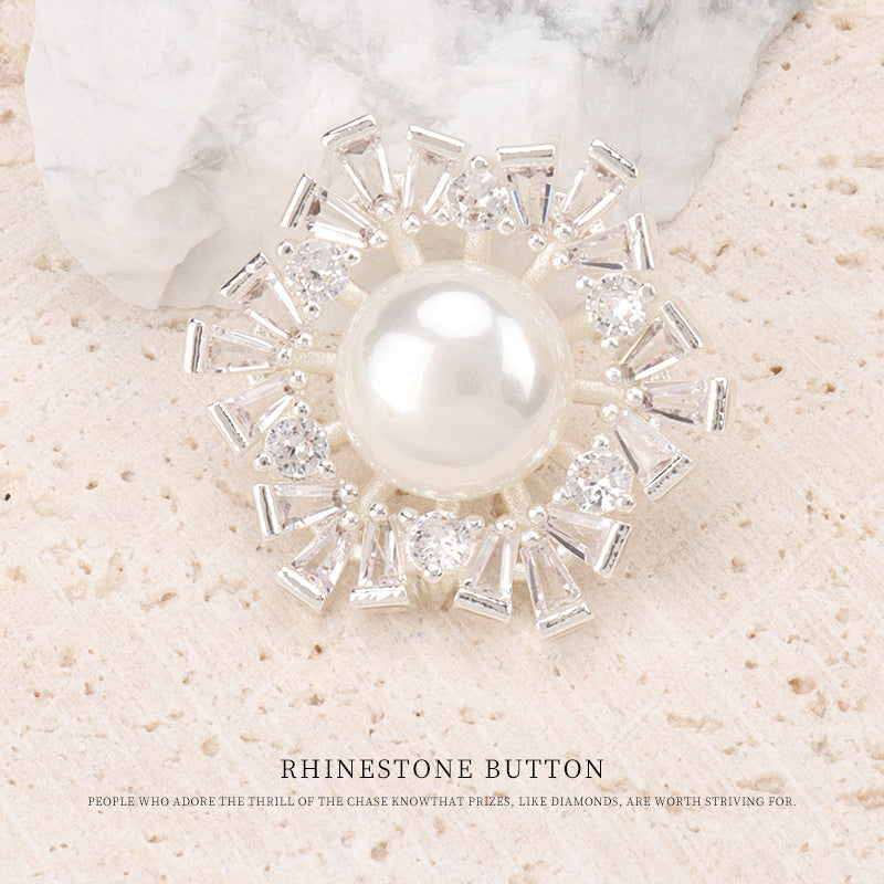 Silver coat button with round pearl center and clear rhinestones