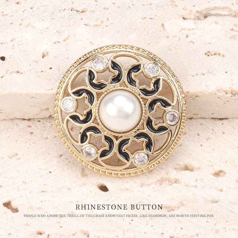 Dotted oil-pearl rhinestone button: gold tone, black enamel filigree, pearl center