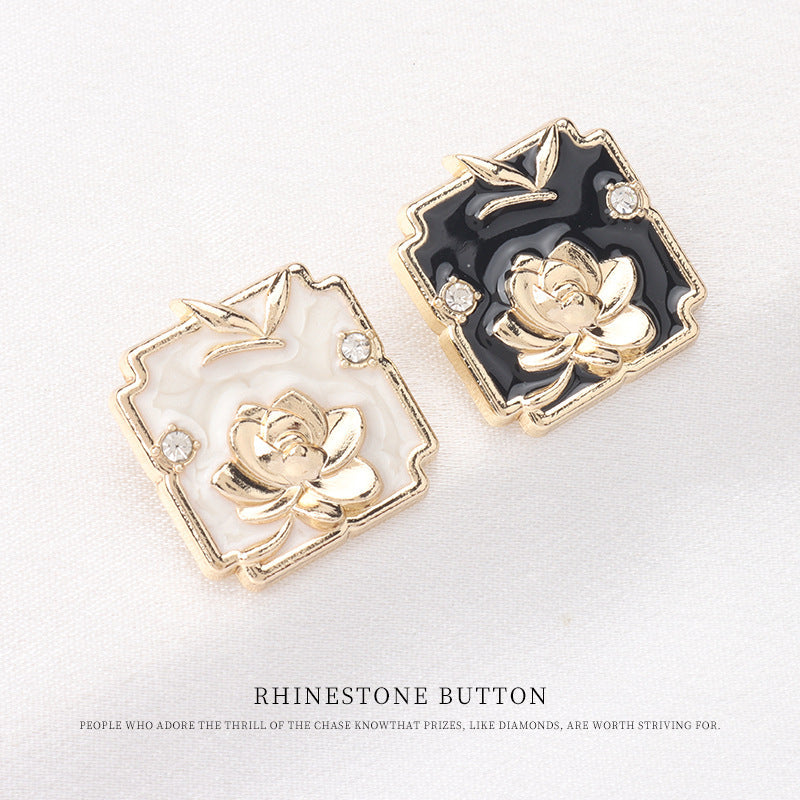 Square metal shank buttons set: black and white enamel, gold lotus with crystal corners
