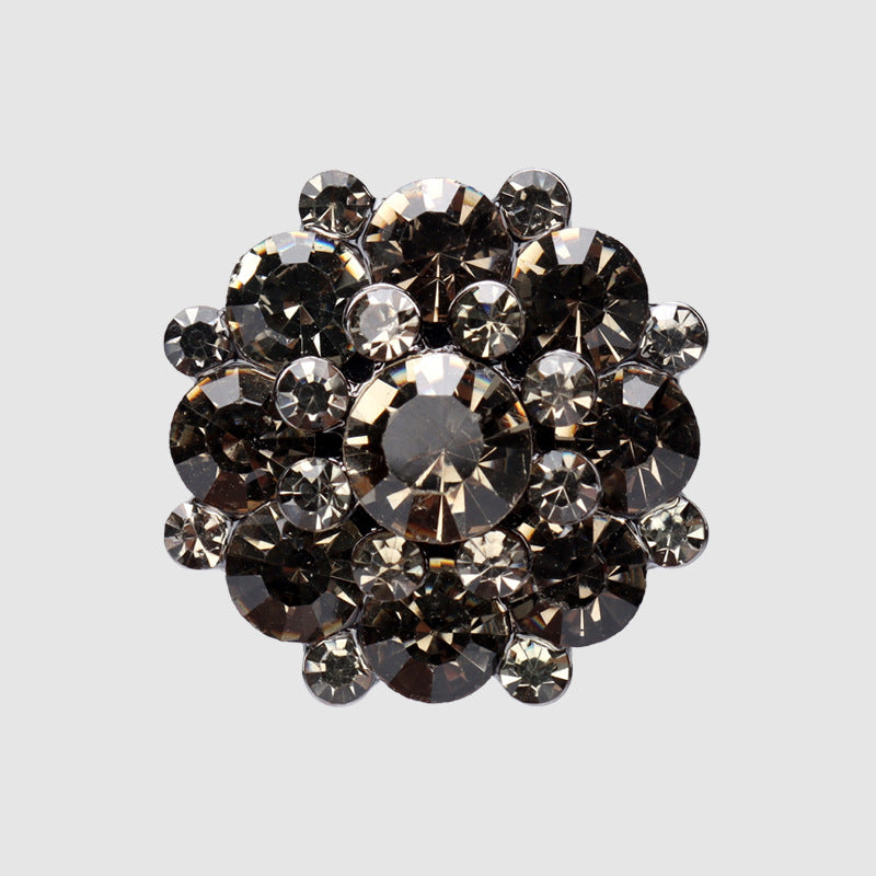 Dark rhinestone metal shank buttons, gunmetal/black gems with silver-tone setting