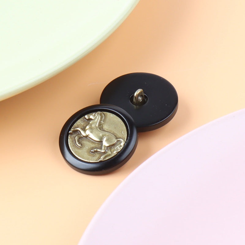 Gold-tone Roman-style horse head metal shank button with black back and shank