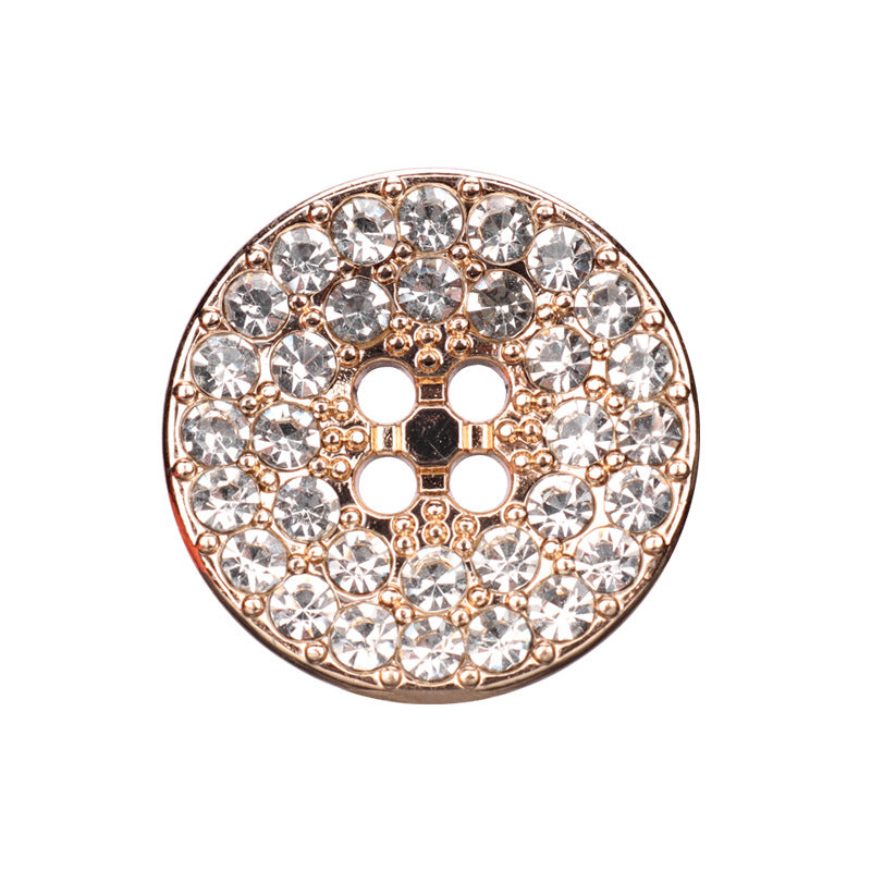 Round gold-toned four-hole rhinestone button with clear stones and rose-gold finish