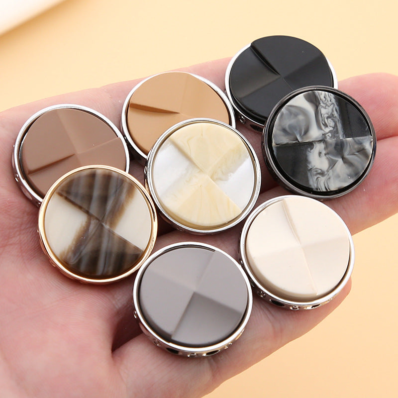 Two-tone resin fan buttons set in mixed colors, round metal shank backs visible