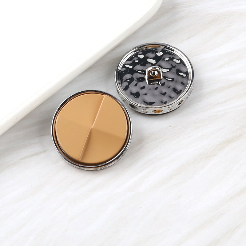 Fan-shaped two-tone resin buttons: beige and black speckled, metal shank