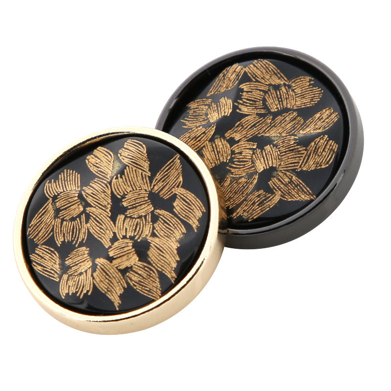 20mm round black resin metal buttons with gold floral engraving, pair close-up