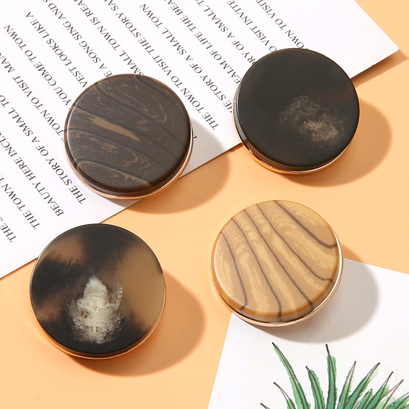 Round resin metal shank buttons in dark, brown, and beige, gold-edged fronts