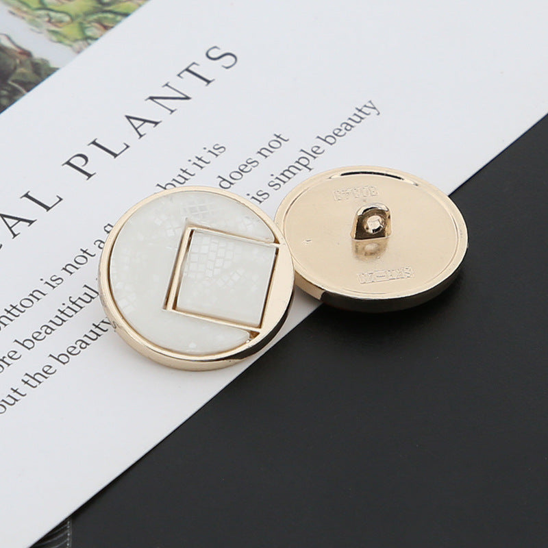 White round shank button pair: front square resin inset and metal shank, gold-tone