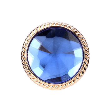 Colored glass button with gold metal shank, blue faceted center, round 25mm
