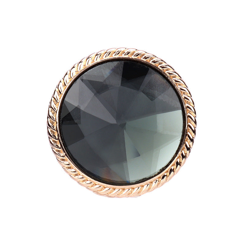 Colored glass button with gold metal shank, gray faceted center, round 25mm