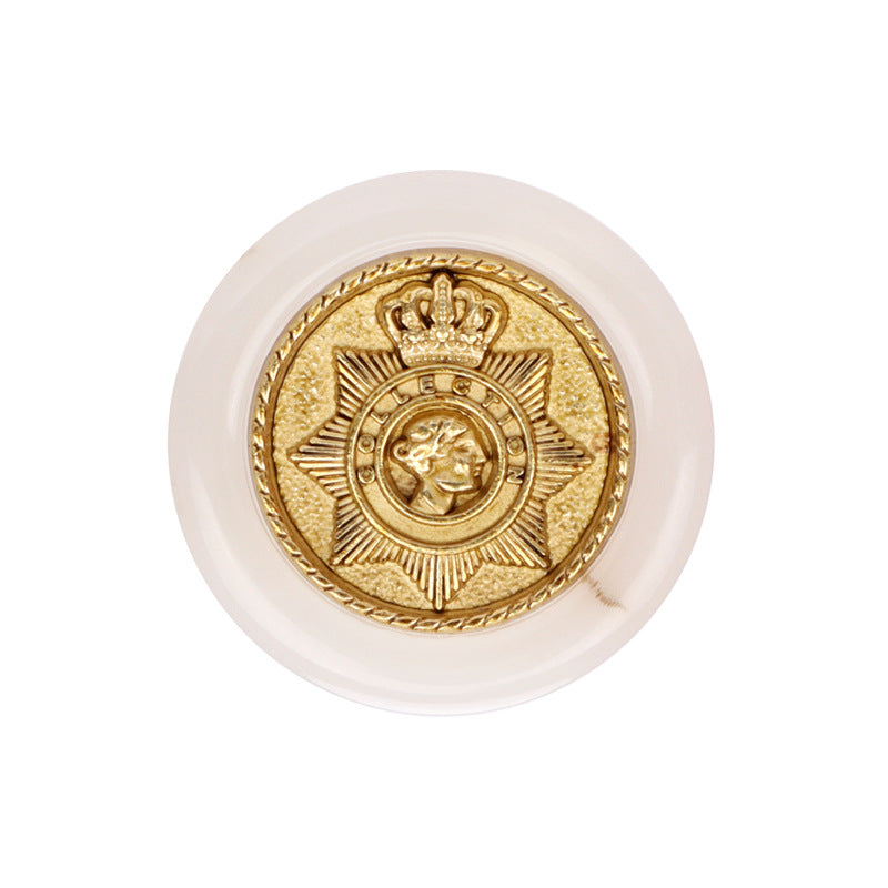 White round resin button with gold crown star crest and raised border
