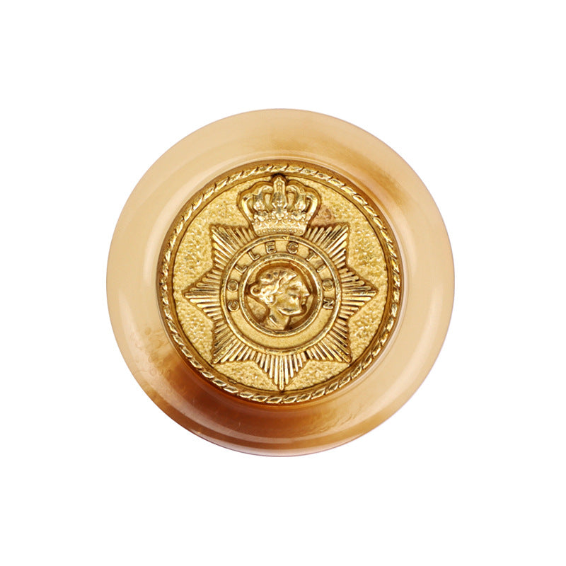 Beige/brown round resin button with gold crown star crest and metal shank