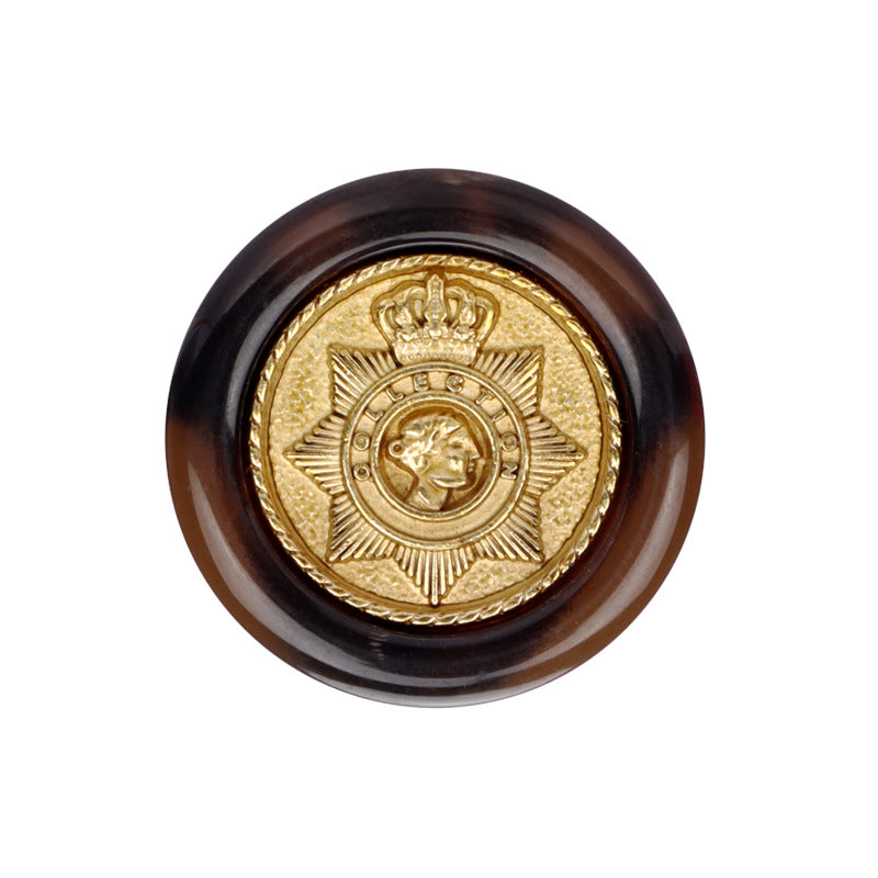 Brown round resin button with gold crown star crest and glossy dark rim