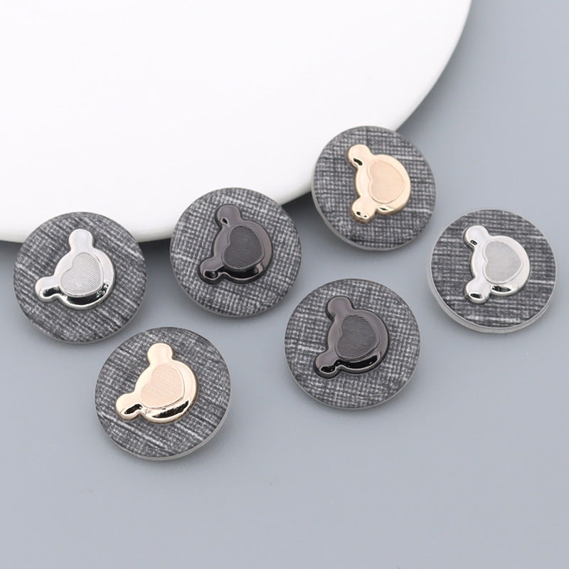 Lotsofbuttons round bear-shaped metal shank buttons with textured backs and inset faces