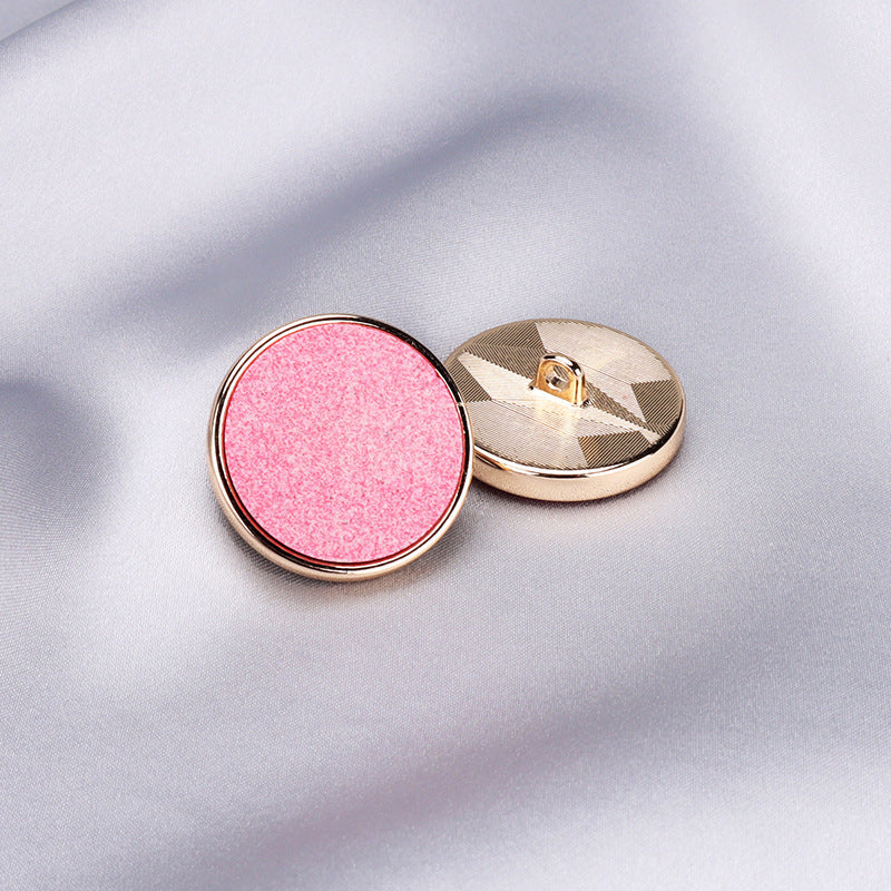 Pink round recycled resin button with metal back and metal base