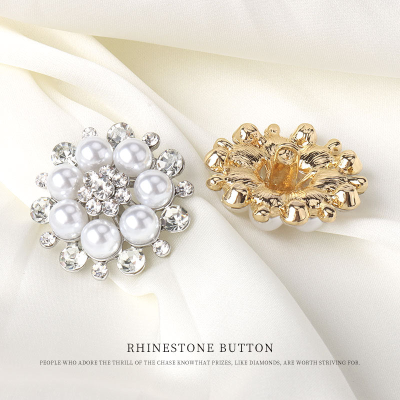 Pearl and rhinestone hand-sewn buttons with shank; one silver-toned, one gold-tone