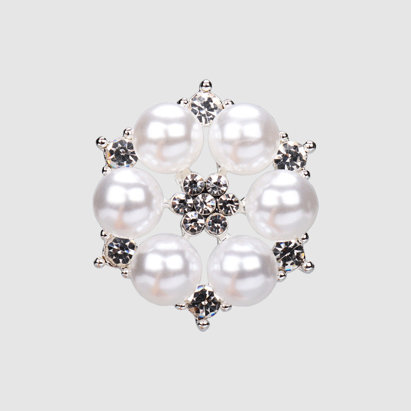 Silver-tone pearl rhinestone button with round faux pearls and a crystal flower center