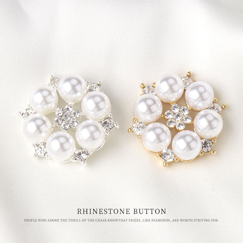 Two rhinestone pearl buttons: silver-tone and gold-tone settings with round faux pearls
