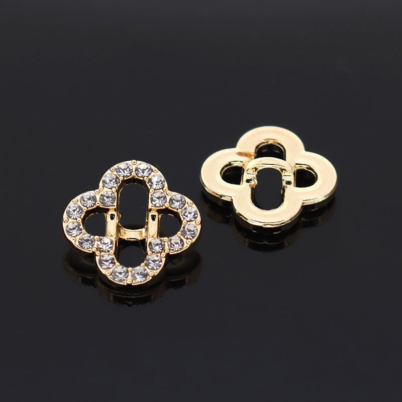 Gold circular hollow rhinestone button, four-petal cutout with sparkling stone edging