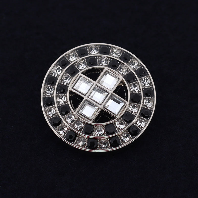Silver-tone round coat button with crystal rhinestone frame, square grid center, shank