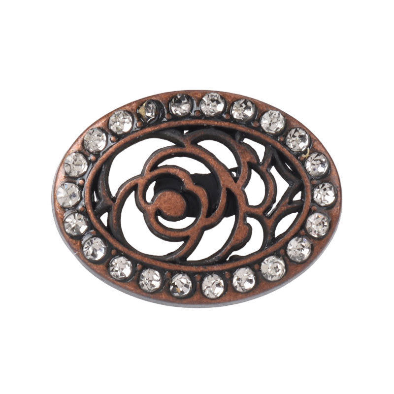 Oval vintage hollow metal button, bronze-red filigree rose, clear rhinestones border