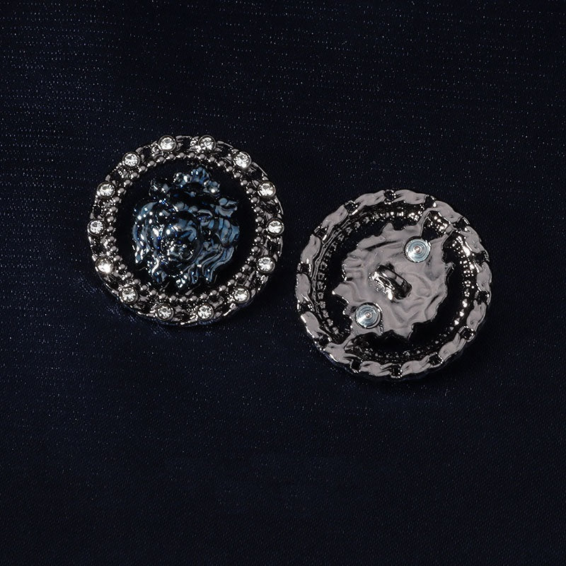 Round shank button back; dark blue lion head front with rhinestones and crystal edge