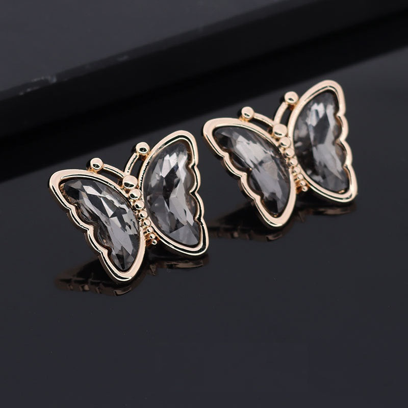 Butterfly metal rhinestone shank buttons, dark gray stones, rose-gold tone frames
