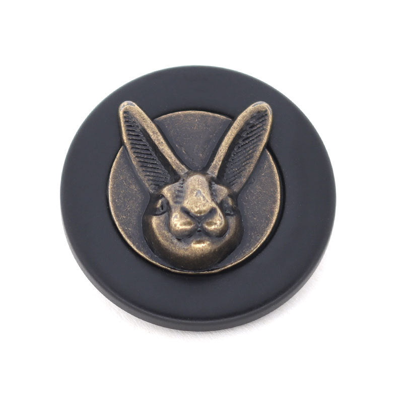 Black rabbit head metal resin shank button, front view with gold-tone design