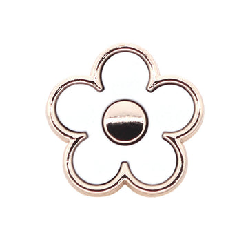 White floral shank button with silver-tone metal rim and dark resin center