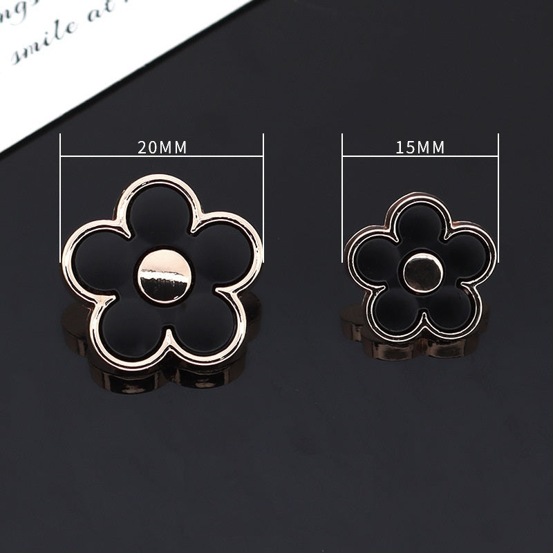20mm and 15mm floral shank buttons in black and white with metal rim