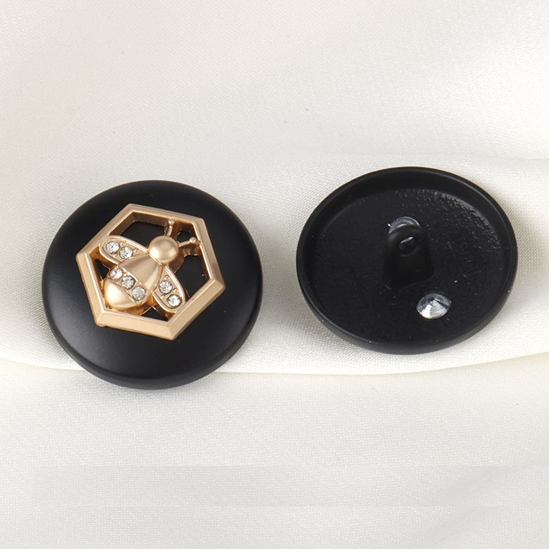 Round black button: gold bee rhinestones front and metal loop back, 18/23mm