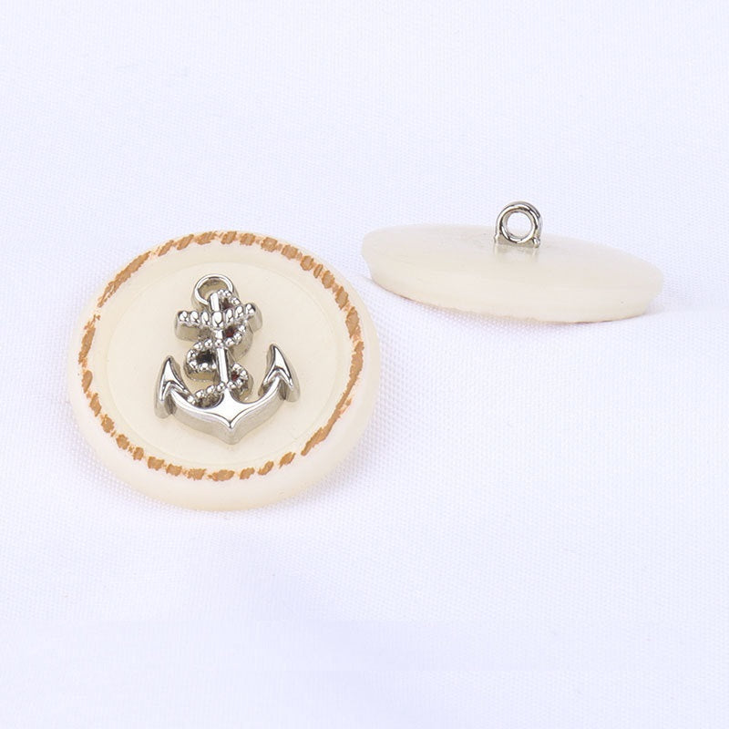 Beige round anchor sewing button with metal shank ring, white back loop visible