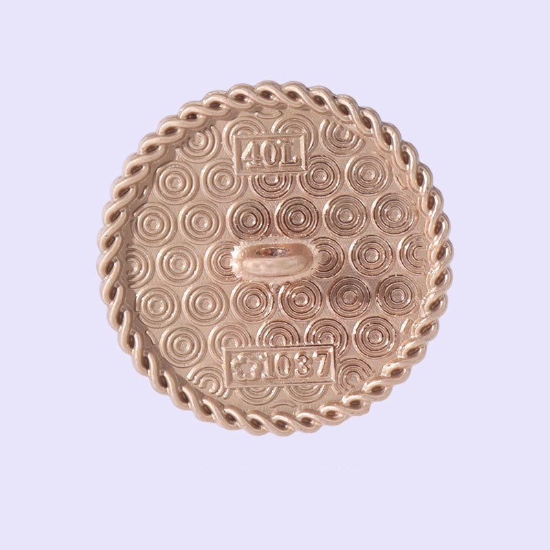 Round pink resin alloy button back, gold-tone shank and embossed pattern