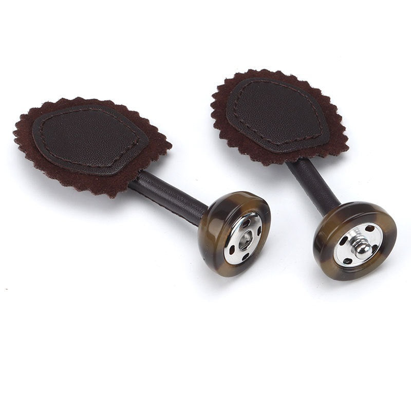 Brown leather buckle snap buttons, 190mm: two scalloped pads with resin snap posts