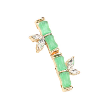Botón verde estilo bambú con pedrería tipo diamante, resina y metal, 31mm