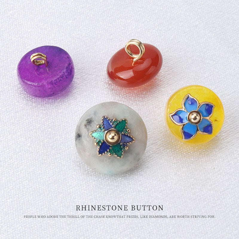 Colorful jade buttons: purple and red solid rounds plus gray and yellow floral mounts