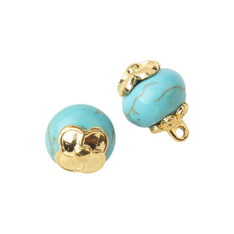 Blue resin flower mount button, round shape with gold shank and flower detail