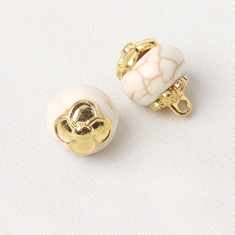 White resin flower mount buttons, round shape with gold shank and floral mount