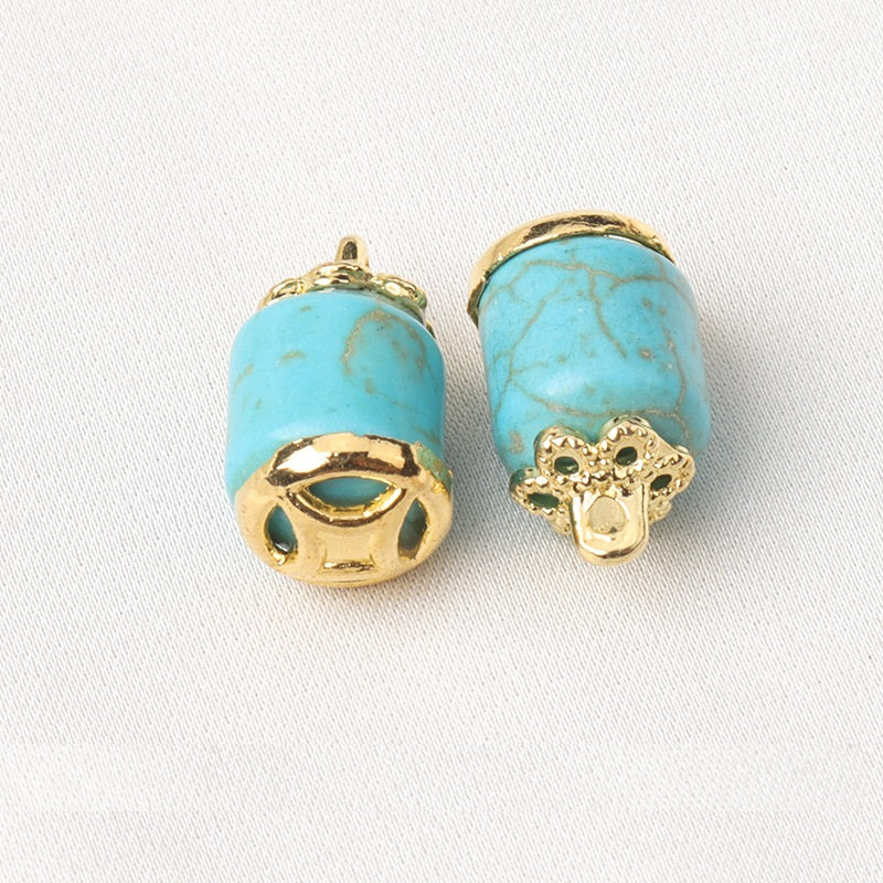 Blue resin flower mount buttons, cylindrical shape with gold shank and flower detail