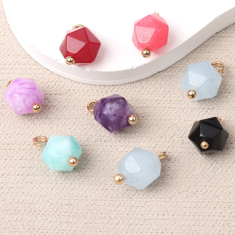 Assorted faceted jade buttons with gold-tone studs: pink, purple, light blue, black