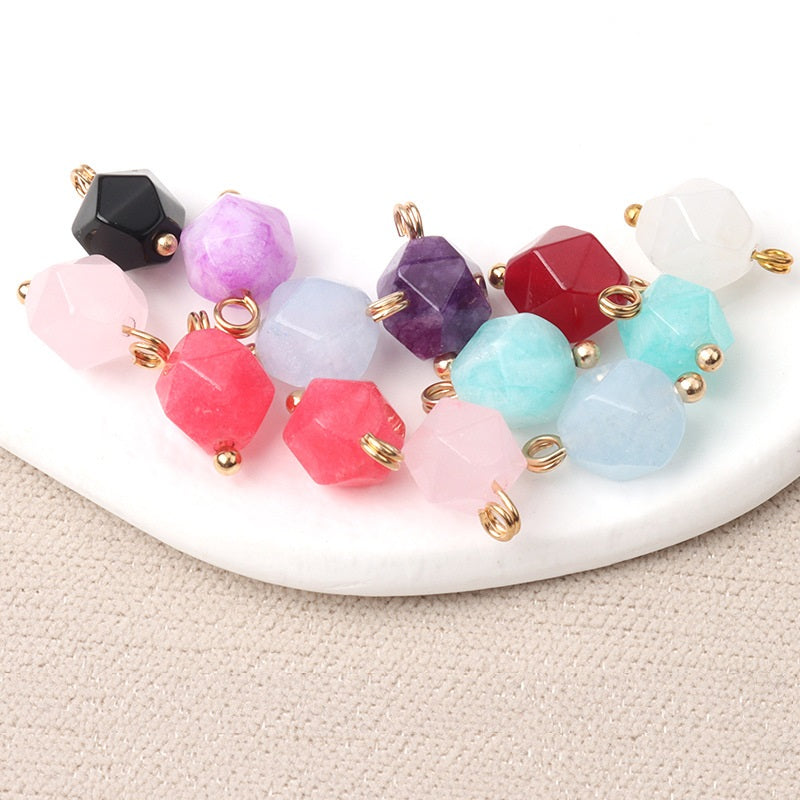 Multi-faceted jade buttons with gold-tone studs in pink, purple, light blue and black