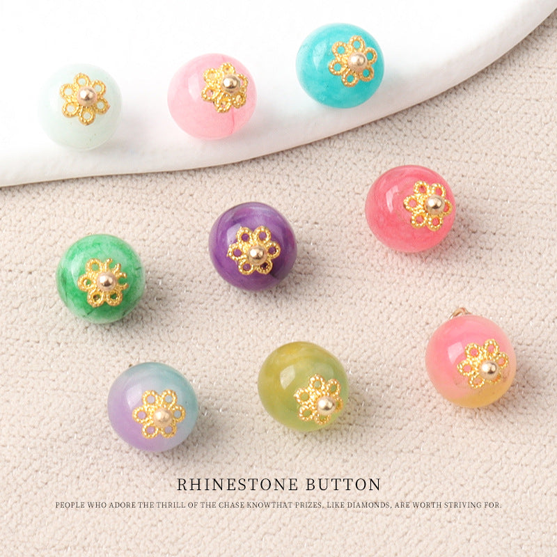 Assorted jade bead buttons with gold flower mounts in purple, teal, pink, green, yellow