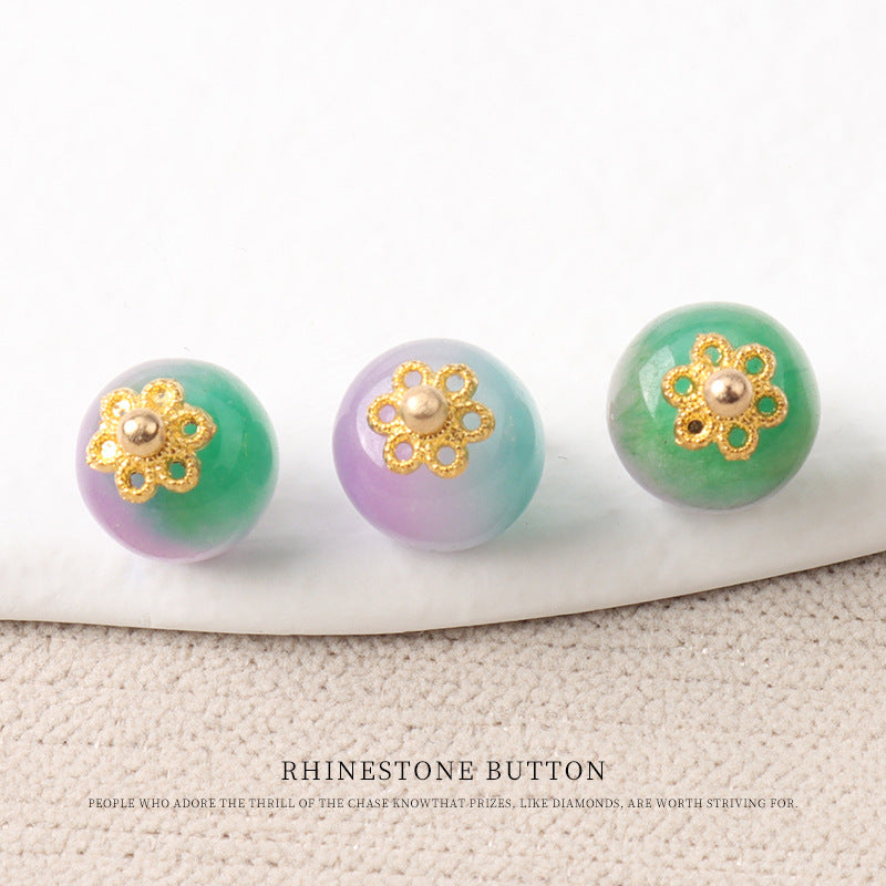 Green and lavender jade bead buttons with gold flower mounts and metal bead centers