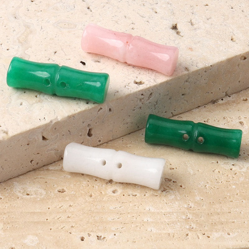 Set Froschknöpfe: rosa, grün und weiß, mit sichtbaren Löchern