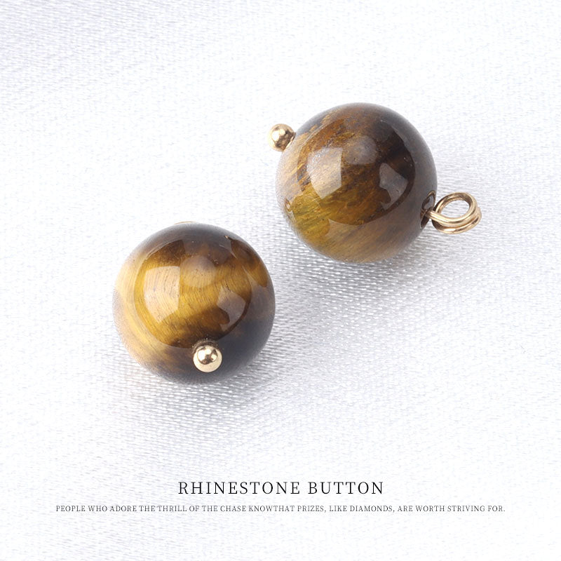 10mm round amber-brown stone bead frog-knot buttons with gold-tone loops, natural stone
