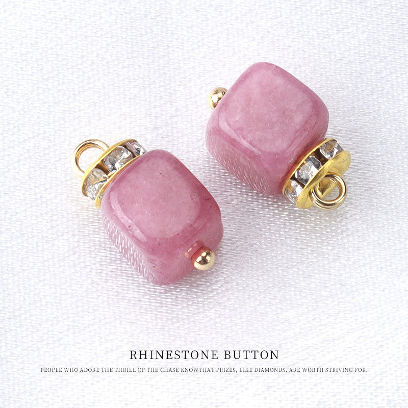 Pink natural stone frog knot button with gold tone loop and rhinestone trim