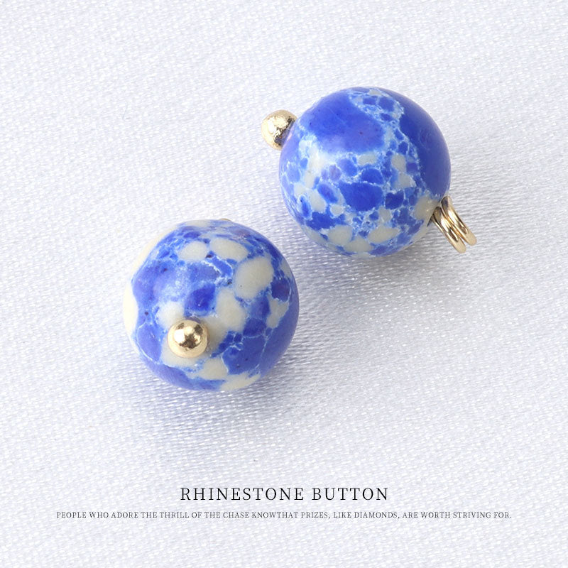 10mm round bead button in bright blue stone pattern, gold stud back and loop