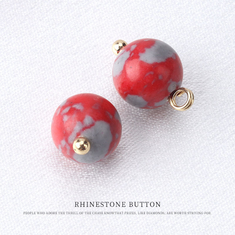 10mm round bead button in red with gray marbling, gold stud and hanging loop