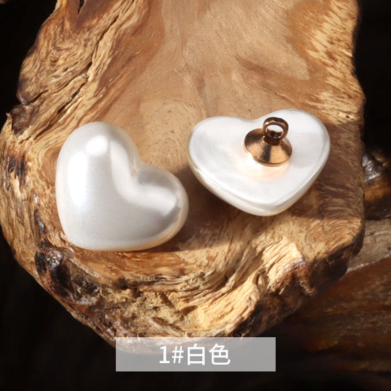 14mm heart-shaped plastic decorative button in bright white with metal shank