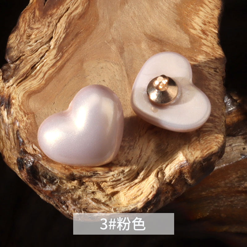 14mm heart-shaped plastic decorative button in pale pink with metal shank